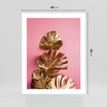 Plakat bez ramy 40x50 - Złote Liście Monstery: Delikatność na Różowym Tle - złote liście monstery, różowe tło