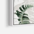 Obraz w ramie 70x50 - Zielony Raj - monstera, palmy - rama biała