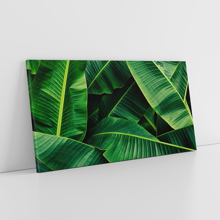 Obraz na płótnie 140x70 - Zaklęta roślinna ekspresja - liście bananowca, gęsto ułożone