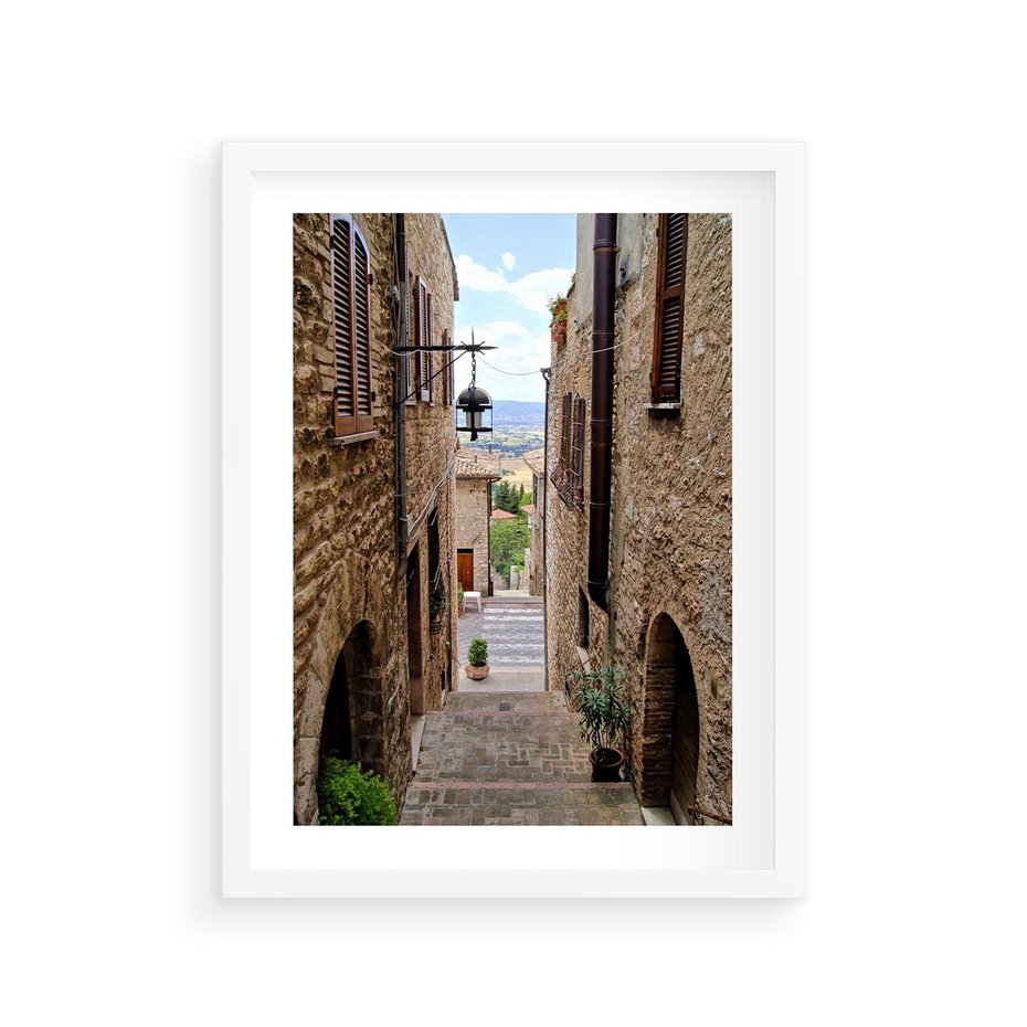 Plakat w ramie 30x40 - Perspektywa malowniczej uliczki - uliczka, perspektywa - rama biała