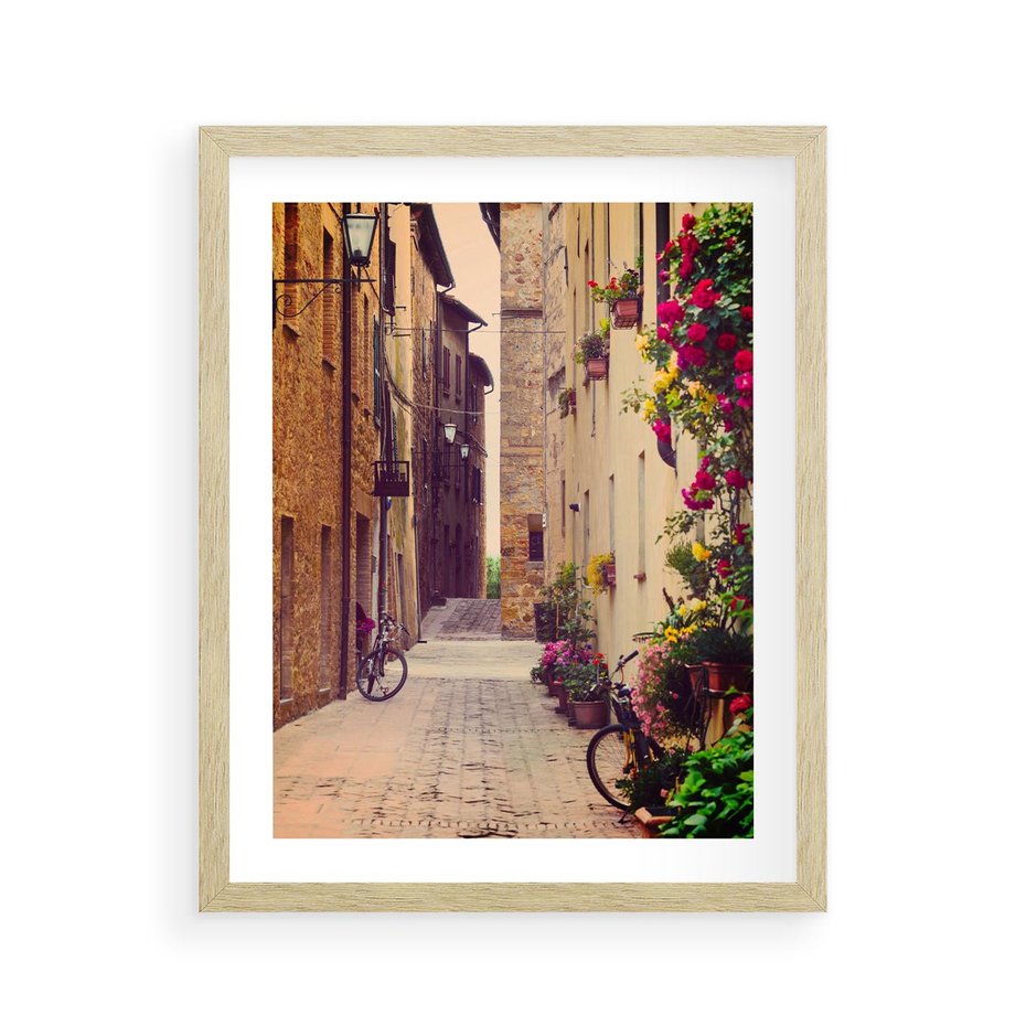 Plakat w ramie 40x50 - Rowerowa przygoda w uliczkach pełnych perspektywy - uliczka, perspektywa - rama drewno