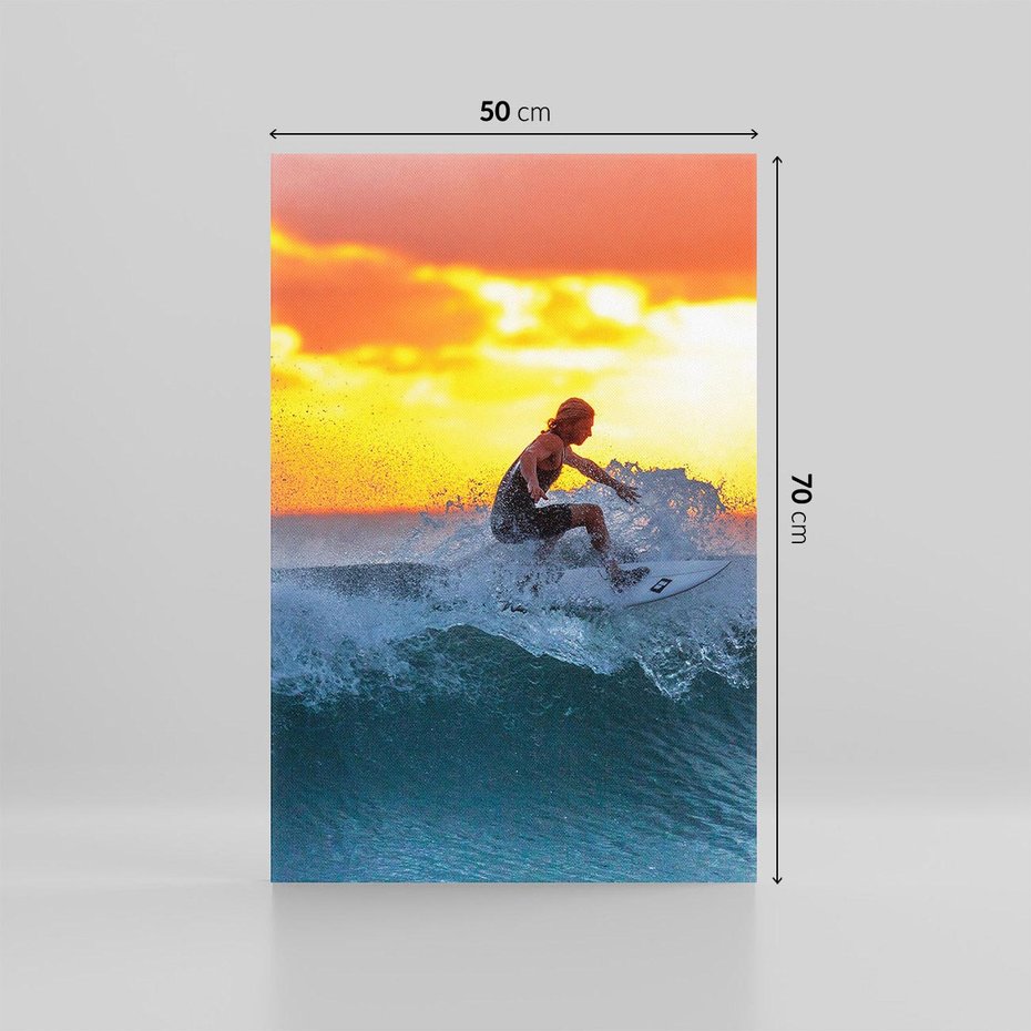 Obraz na płótnie 50x70 - Surfer na falach morza: Spotkanie z wolnością - surfer, surfing