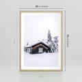 Plakat w ramie 50x70 - Zimowy Azyl: Domek w Górach - domek w górach, śnieg - rama drewno