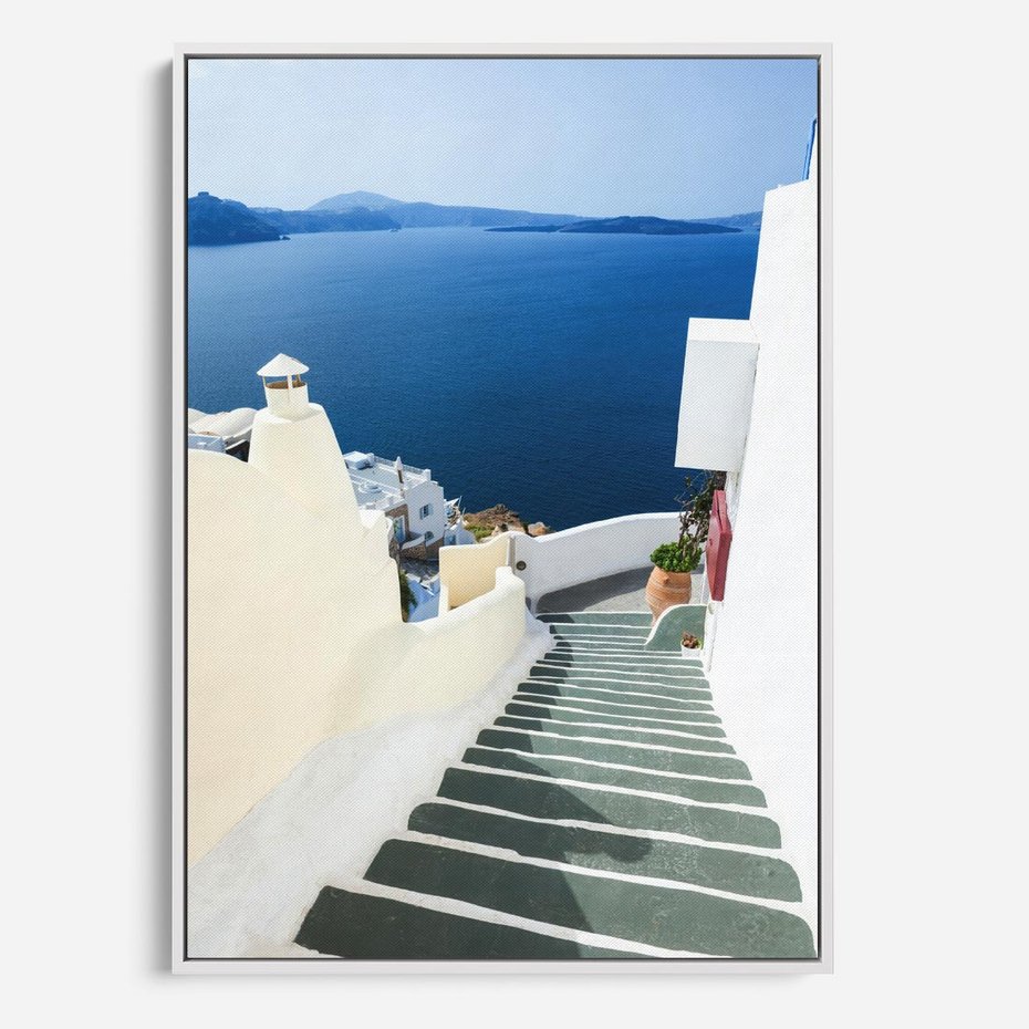 Obraz w ramie 50x70 - Malowniczy urok wyspy - Santorini, schodki - rama biała