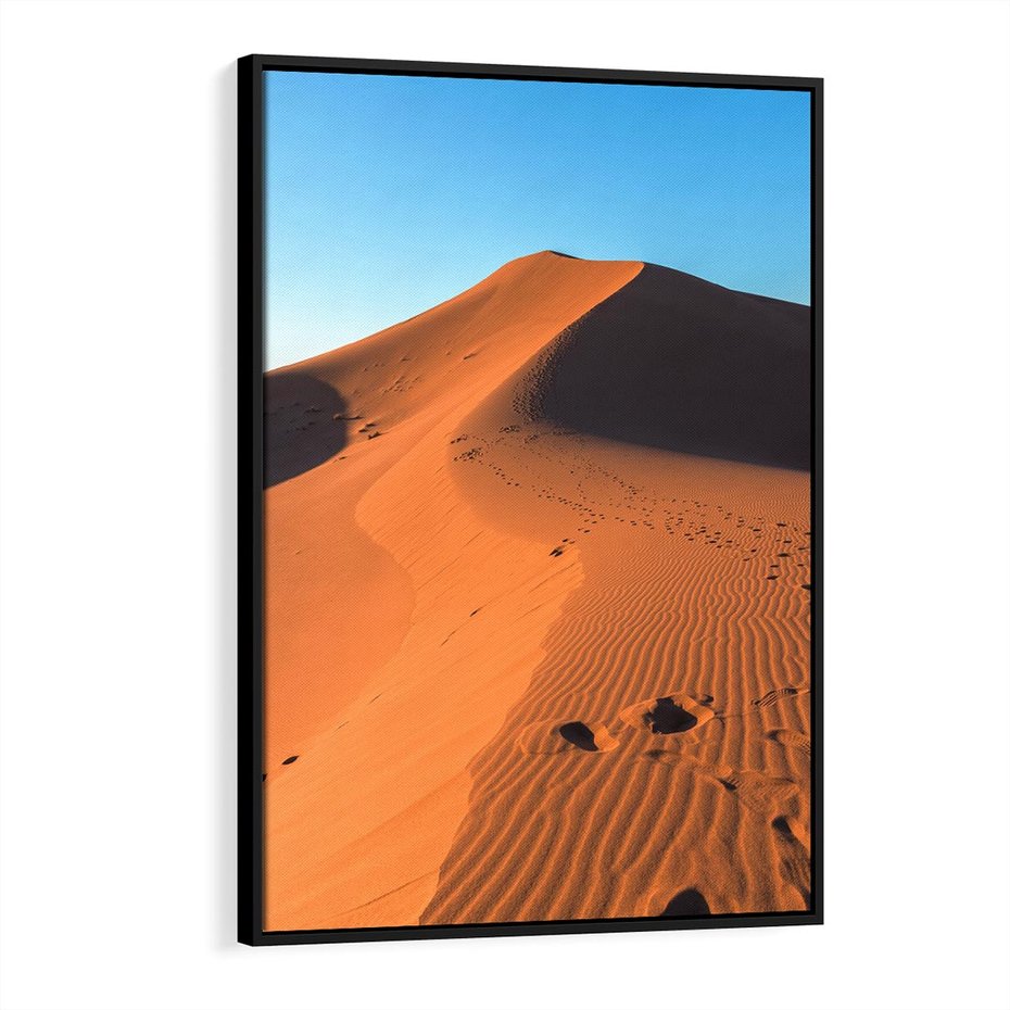 Obraz w ramie 50x70 - Piasek pustyni wędruje - pustynia, piasek - rama czarna