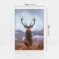 Obraz w ramie 50x70 - Jeleń w Uśpionym Krajobrazie - jeleń na tle gór, ośnieżone góry - rama biała
