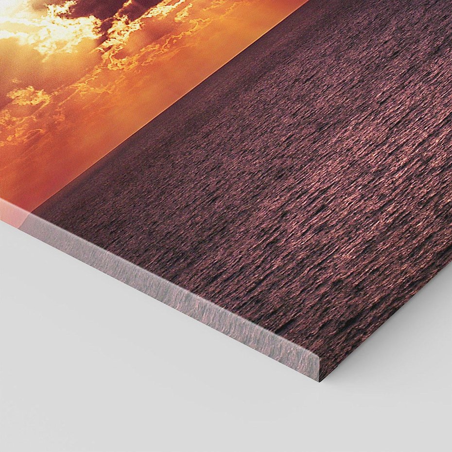 Obraz na płótnie 50x70 - Słońce i chmury nad morzem - słońce, chmury