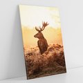 Obraz na płótnie 70x100 - Magia jesiennego słońca: Jeleń w promieniach - jeleń, jesień