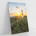 Obraz na płótnie 80x120 - Magia latarni przy zachodzie - latarnia, zachód