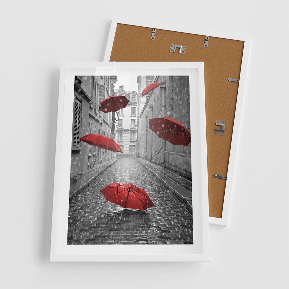 Plakat w ramie 50x70 - Parasole w malowniczej uliczce - parasole, uliczka - rama biała