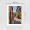 Plakat w ramie 30x40 - Uliczka Wakacyjnego Miasteczka - uliczka, wakacje - rama biała