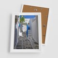 Plakat w ramie 50x70 - Uroki Santorini: Perspektywiczna Uliczka - uliczka, perspektywa - rama biała