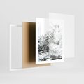Plakat w ramie 40x50 - Chwila Zimowej Magii - iglasta gałązka, śnieg - rama biała