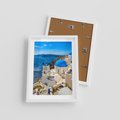 Plakat w ramie 30x40 - Urokliwy widok na Santorini - Santorini, widok - rama biała