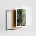 Plakat w ramie 30x40 - Żywiołowa Zieleń - mur, liście - rama czarna