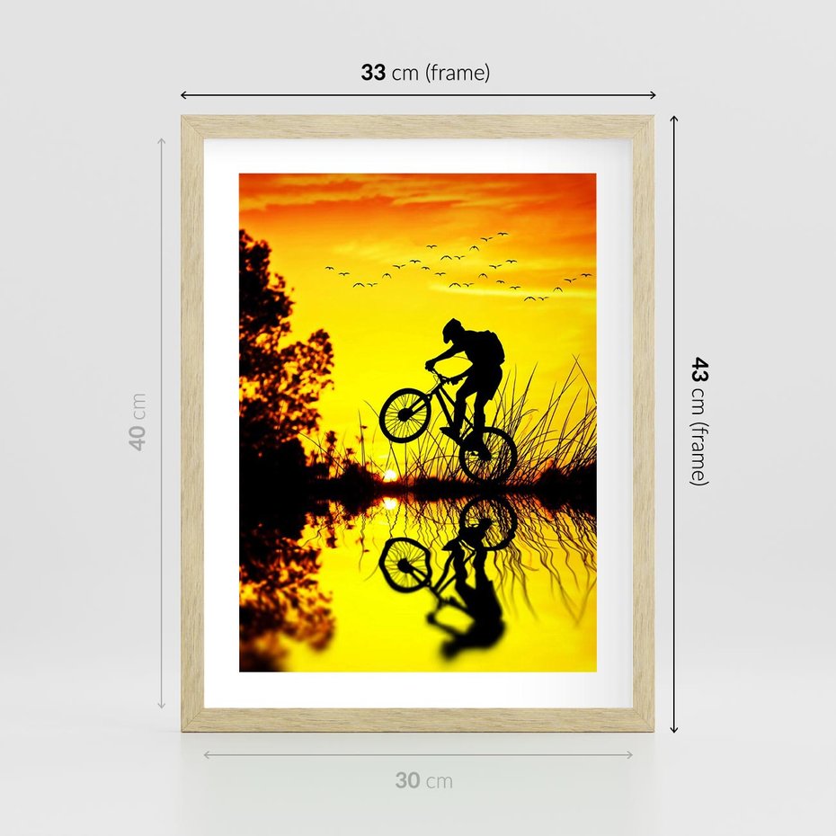Plakat w ramie 30x40 - Rower przy zachodzie słońca - rower, zachód - rama drewno