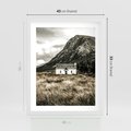 Plakat w ramie 40x50 - Biały Domek w Sepii: Wiejski Urok - domek w górach, kolory sepii - rama biała