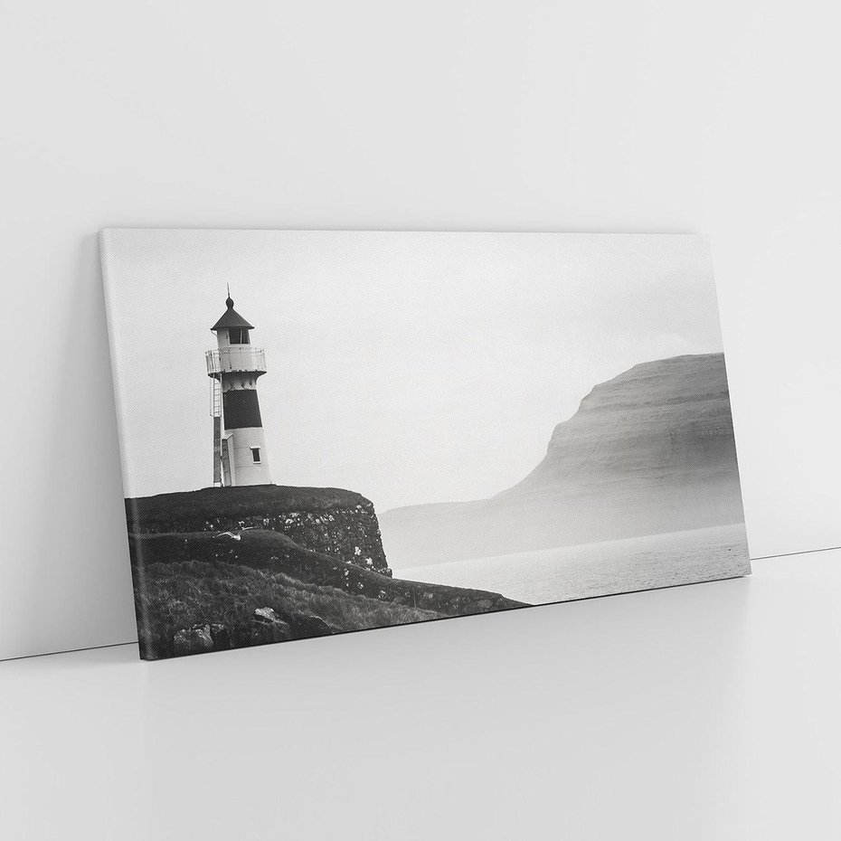 Obraz na płótnie 120x60 - Melancholia Północy - czarnobiała fotografia, nadmorska latarnia na klifie