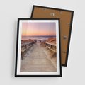 Plakat w ramie 50x70 - Spacer Wśród Przyboju - dróżka, morze - rama czarna