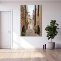 Obraz na płótnie 70x100 - Perspektywa malowniczej uliczki - uliczka, perspektywa