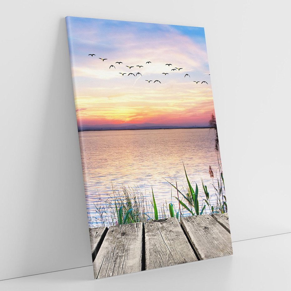 Obraz na płótnie 50x70 - Romantyczny zachód słońca nad morzem z ptakami - zachód, słońca