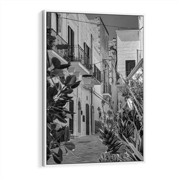 Obraz w ramie 50x70 - Nadmorska Uliczka - czarno białe zdjecie, uliczka w nadmorskim mieście - rama biała