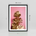 Plakat w ramie 50x70 - Złote Liście Monstery: Delikatność na Różowym Tle - złote liście monstery, różowe tło - rama czarna
