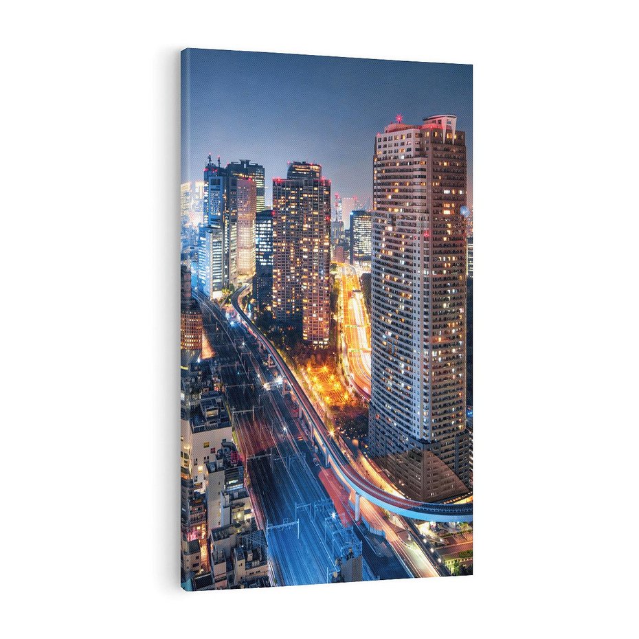 Obraz na płótnie 70x100 - Miasto nocą z wieżowcami w tle - miasto, nocą