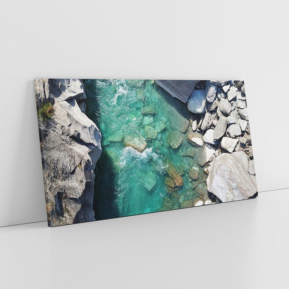 Obraz na płótnie 140x70 - Spotkanie natury i siły - rzeka, skały