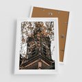 Plakat w ramie 50x70 - Jesienna Wieża w Liściach - architektura, wieża - rama biała
