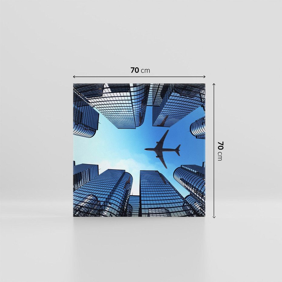 Obraz na płótnie 70x70 - Miasto o niezwykłym widoku - latające samoloty - miasto, samolot