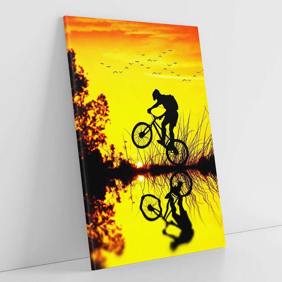 Obraz na płótnie 70x100 - Rower przy zachodzie słońca - rower, zachód