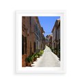 Plakat w ramie 40x50 - Urok uliczki: perspektywa miasta - uliczka, perspektywa - rama biała