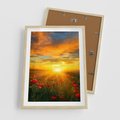 Plakat w ramie 50x70 - Magia zachodu słońca na łące z makami - łąka, zachód słońca - rama drewno