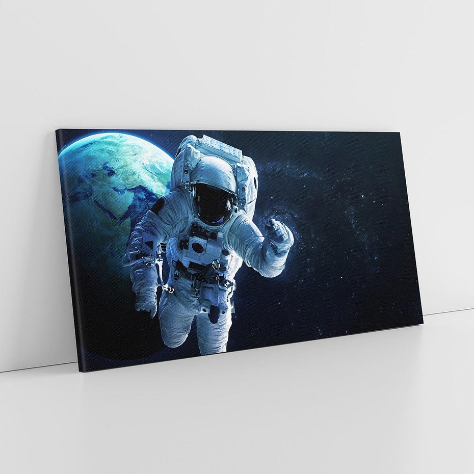 Obraz na płótnie 120x60 - kosmiczna podróż - kosmonauta, ziemia
