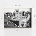 Obraz w ramie 120x80 - Miasto w Retro Odsłonie - fotografia czarno biała, ujęcie na dachy wielkiego miasta - rama drewno