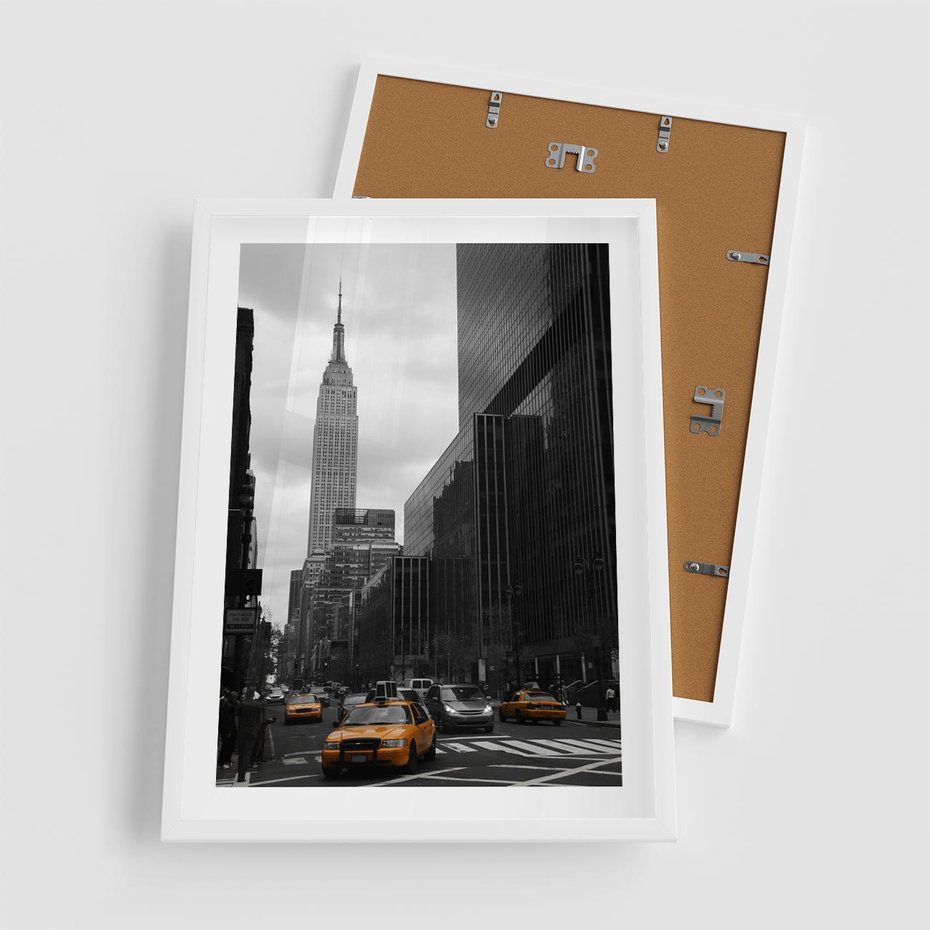 Plakat w ramie 50x70 - Nowy York, taksówka w ruchu - Nowy York, taksówka - rama biała