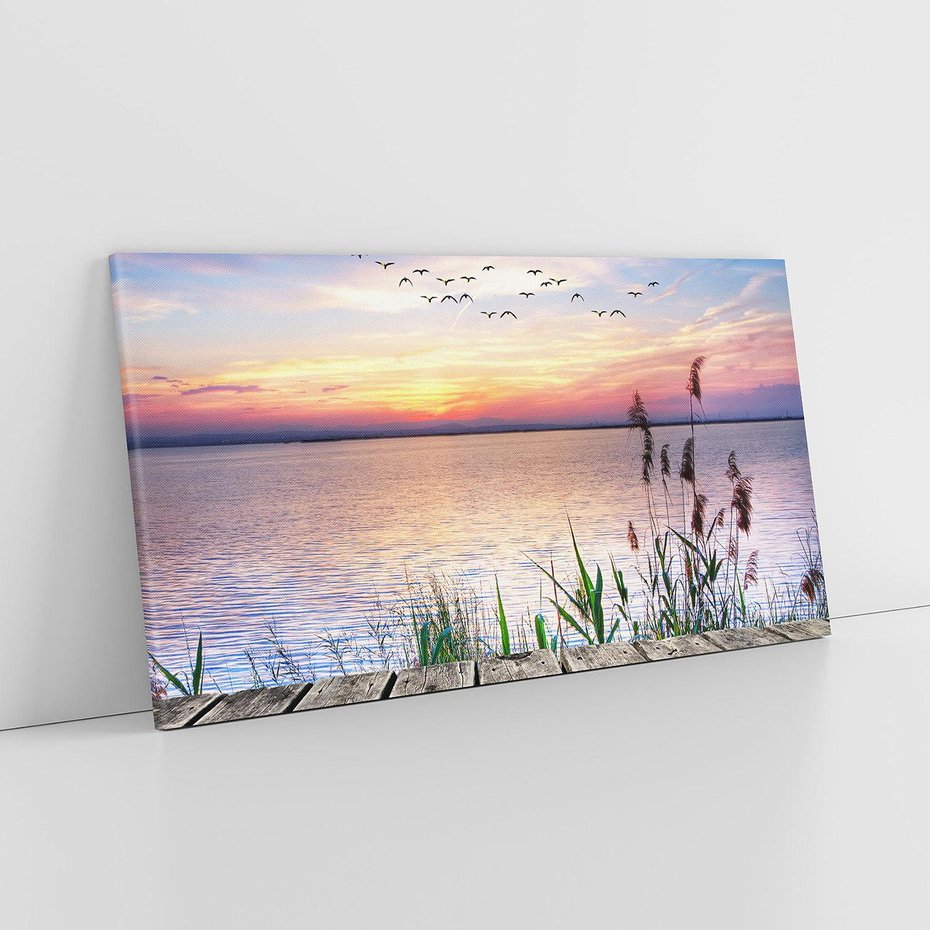Obraz na płótnie 140x70 - Romantyczny zachód słońca nad morzem z ptakami - zachód, słońca