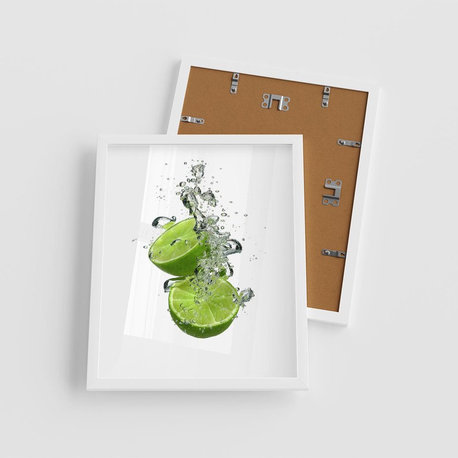 Plakat w ramie 40x50 - Kuchenne limonki na stole - limonki, kuchnia - rama biała