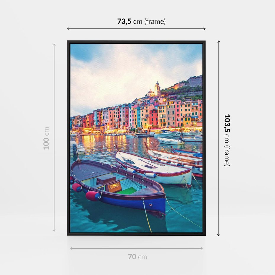 Obraz w ramie 70x100 - Tańczące kolory zachodu - nadmorskie kolorowe miast, kolorowe budynki na brzegu - rama czarna