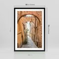 Plakat w ramie 50x70 - Magiczna podróż w głąb miasta - uliczka, perspektywa - rama czarna
