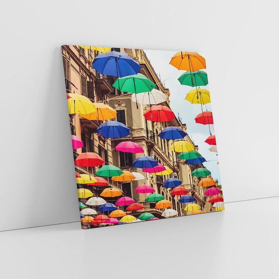 Obraz na płótnie 50x50 - Barwna symfonia wyobraźni - fotografia, kolorowe parasolki podwieszone nad ulicą