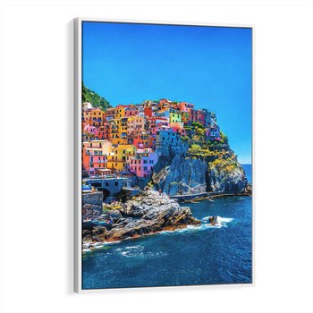 Obraz w ramie 70x100 - Barwne Wybrzeże - nadmorskie miasto na klifie, kolorowe tęczowe budynki - rama biała
