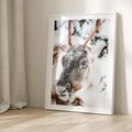 Plakat w ramie 50x70 - Renifer w Zimowej Krainie - renifer, zima - rama biała