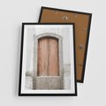 Plakat w ramie 50x70 - Śródziemnomorskie Drzwi Czasu - fotografia starych drzwi, śródziemnomorska architektura - rama czarna