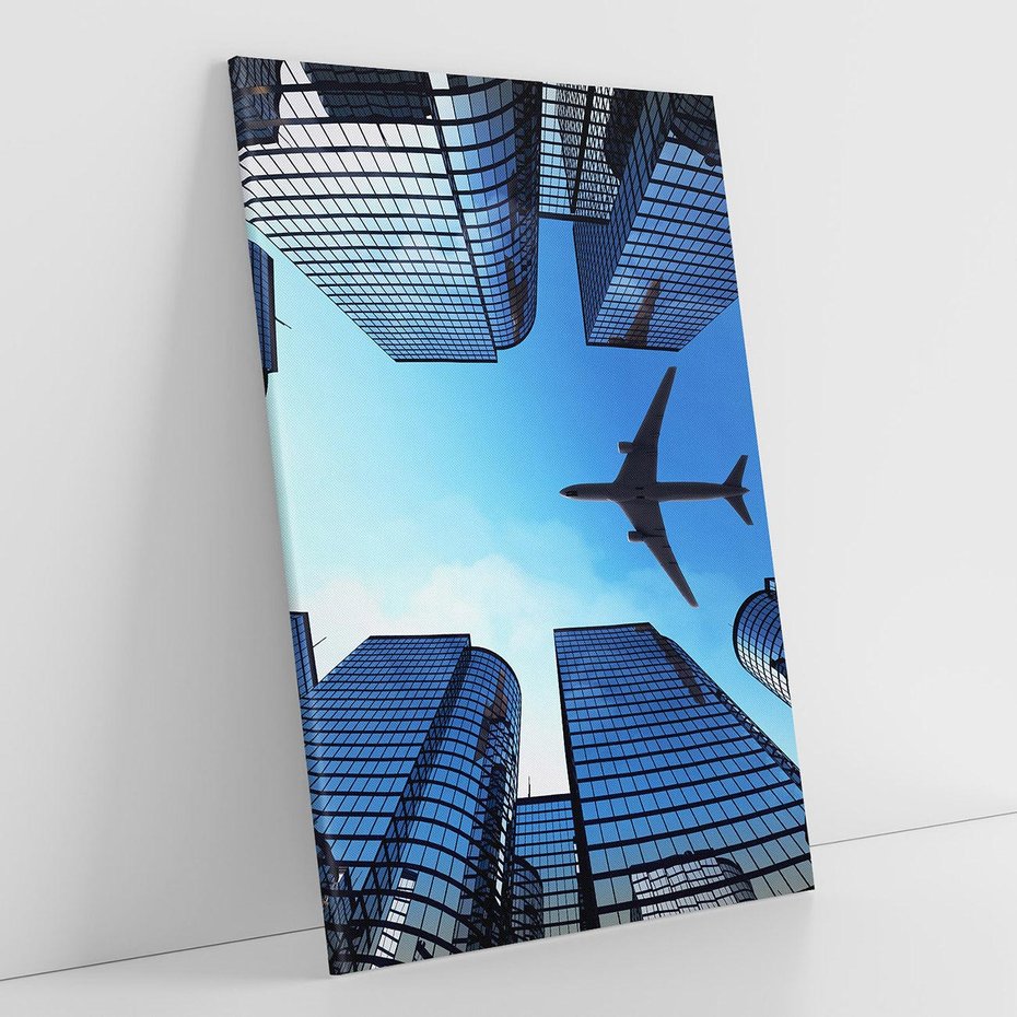 Obraz na płótnie 80x120 - Miasto o niezwykłym widoku - latające samoloty - miasto, samolot