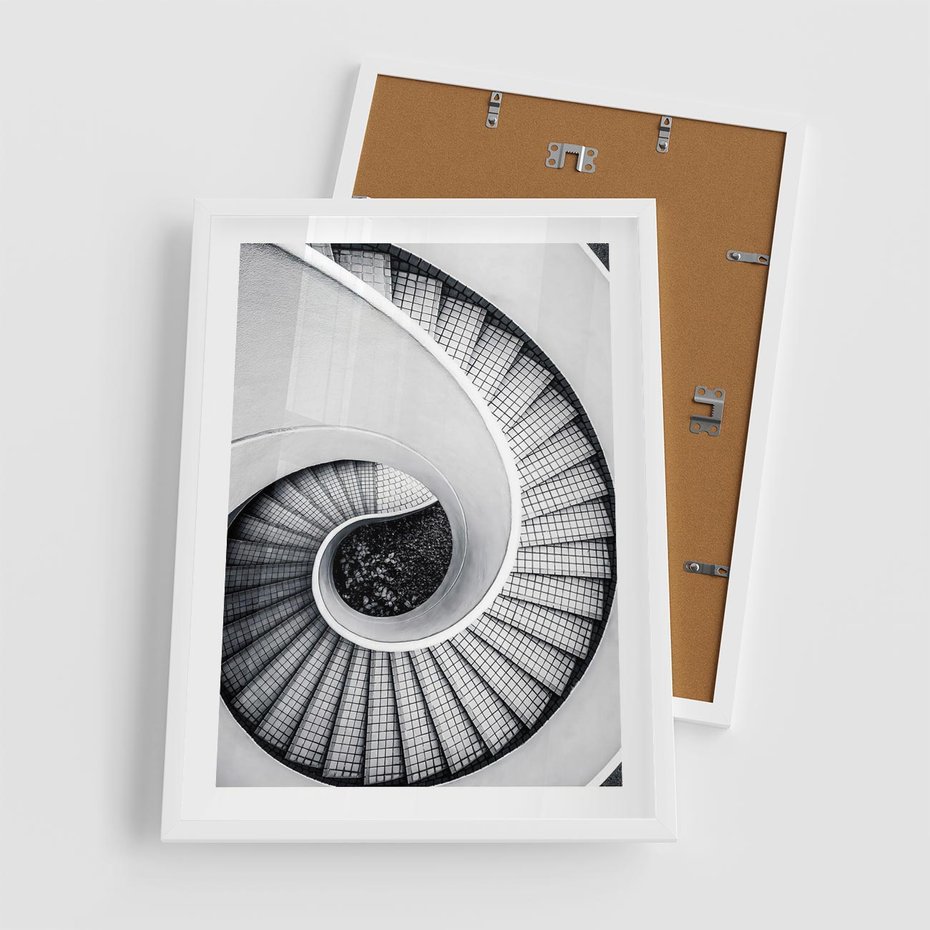 Plakat w ramie 50x70 - Nowoczesne Schody: Kręcone Piękno - nowoczesna architektura, kręcone schody - rama biała