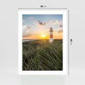 Plakat bez ramy 30x40 - Magia latarni przy zachodzie - latarnia, zachód