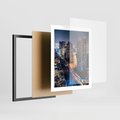 Plakat w ramie 40x50 - Miasto nocą z wieżowcami w tle - miasto, nocą - rama czarna