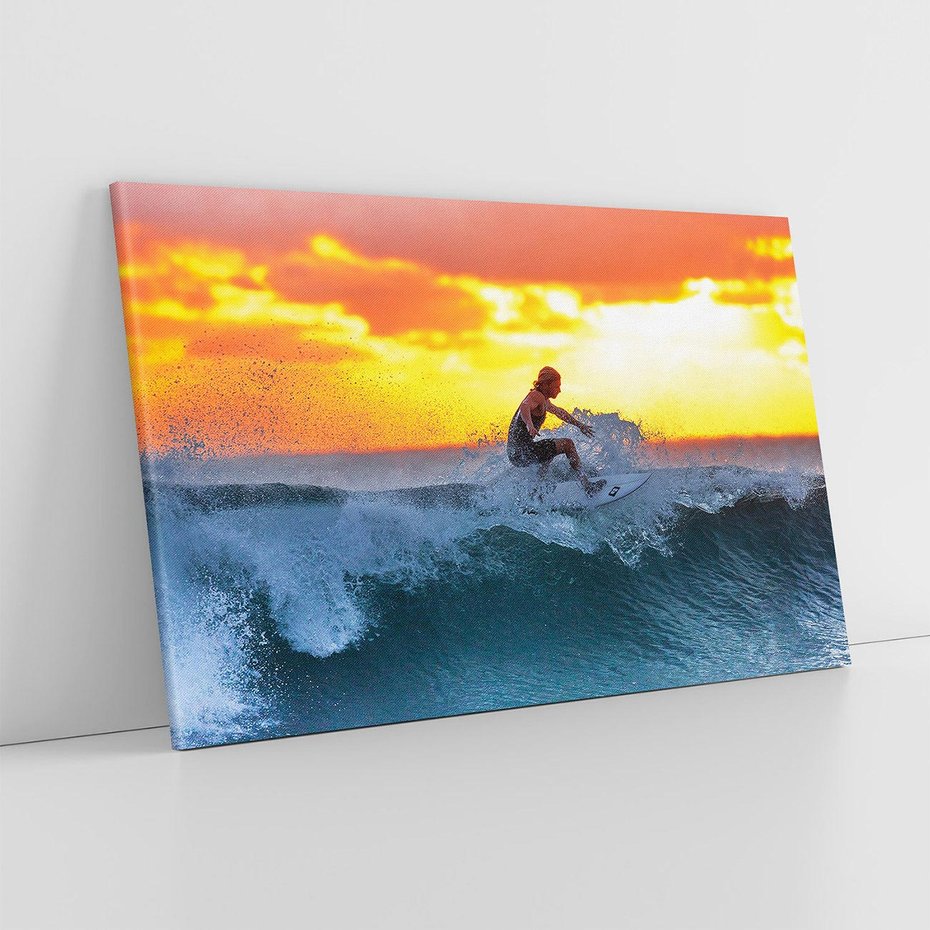 Obraz na płótnie 100x70 - Surfer na falach morza: Spotkanie z wolnością - surfer, surfing